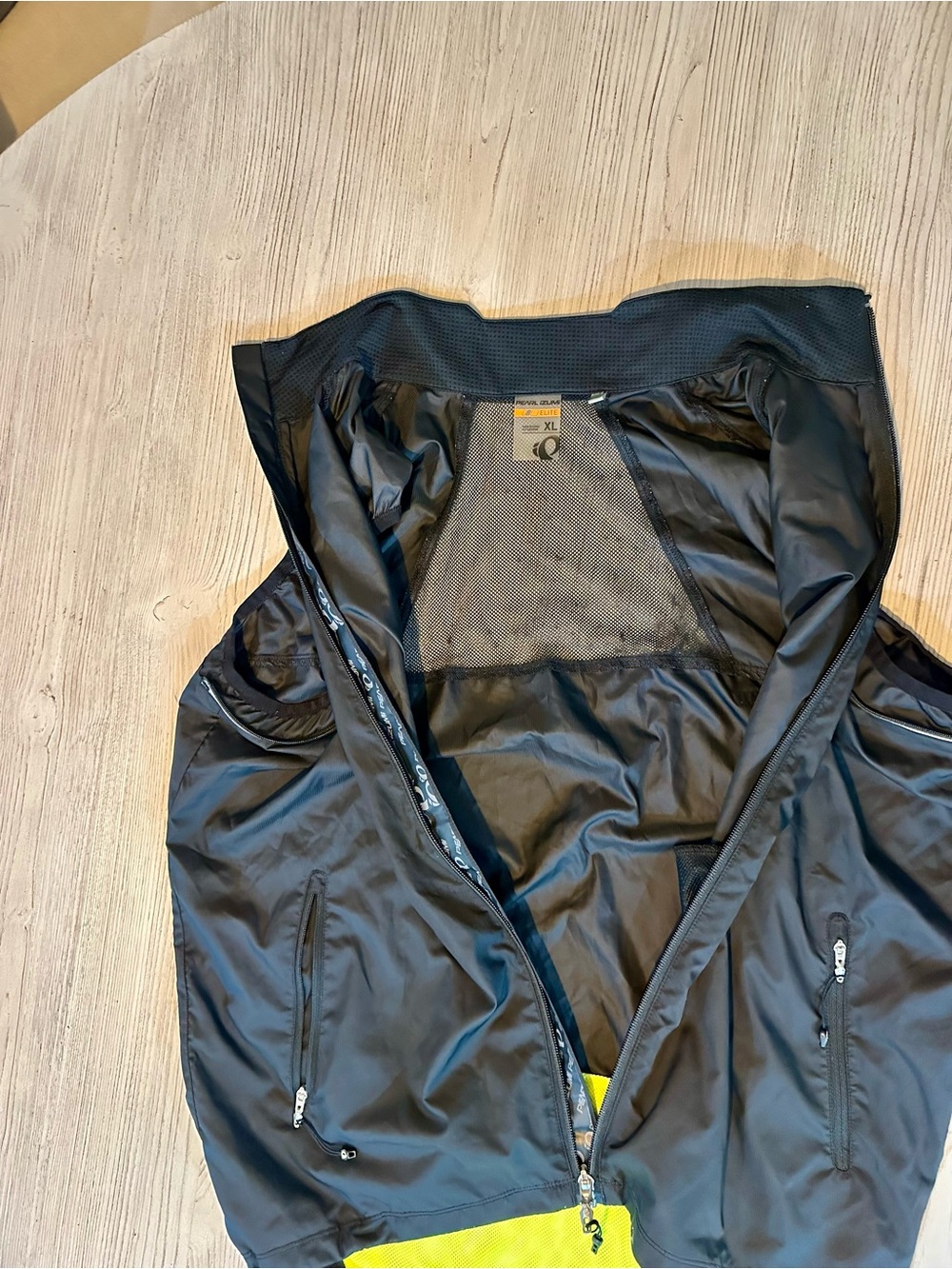 Pearl Izumi Black Jacket with Yellow Lining - Picture 8 of 9